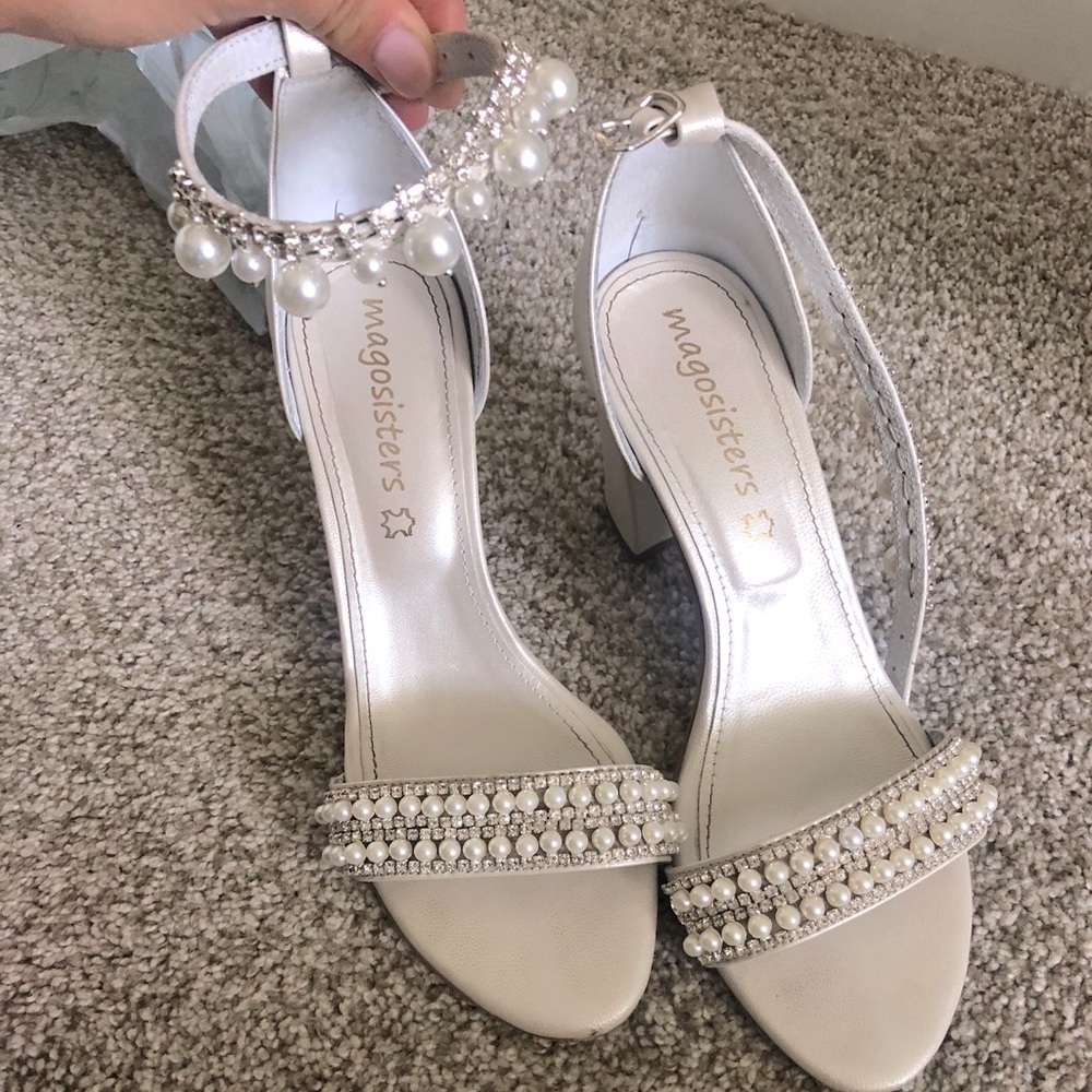 White hand made heels